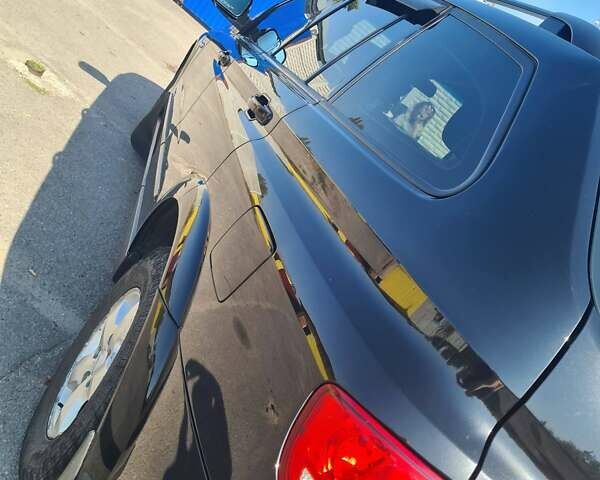 Чорний Cанг Йонг Kyron, об'ємом двигуна 2 л та пробігом 133 тис. км за 10000 $, фото 34 на Automoto.ua