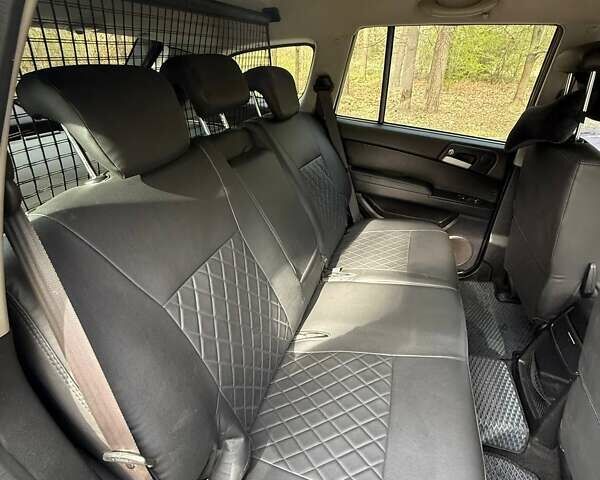 Черный Cанг Йонг Кирон, объемом двигателя 2 л и пробегом 150 тыс. км за 8300 $, фото 13 на Automoto.ua