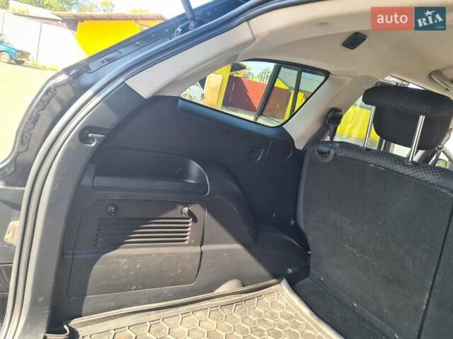 Чорний Cанг Йонг Kyron, об'ємом двигуна 2 л та пробігом 133 тис. км за 10000 $, фото 28 на Automoto.ua