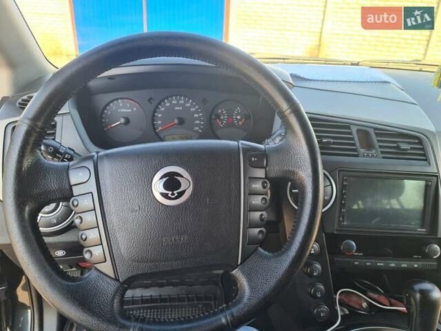 Чорний Cанг Йонг Kyron, об'ємом двигуна 2 л та пробігом 133 тис. км за 10000 $, фото 18 на Automoto.ua
