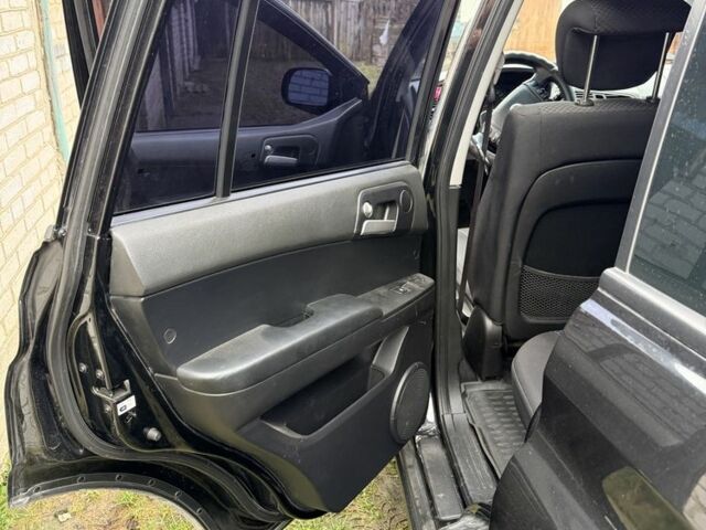 Чорний Cанг Йонг Kyron, об'ємом двигуна 2.3 л та пробігом 113 тис. км за 7500 $, фото 13 на Automoto.ua