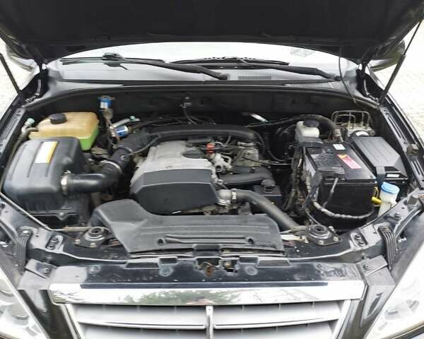 Черный Cанг Йонг Кирон, объемом двигателя 2.3 л и пробегом 129 тыс. км за 6900 $, фото 8 на Automoto.ua