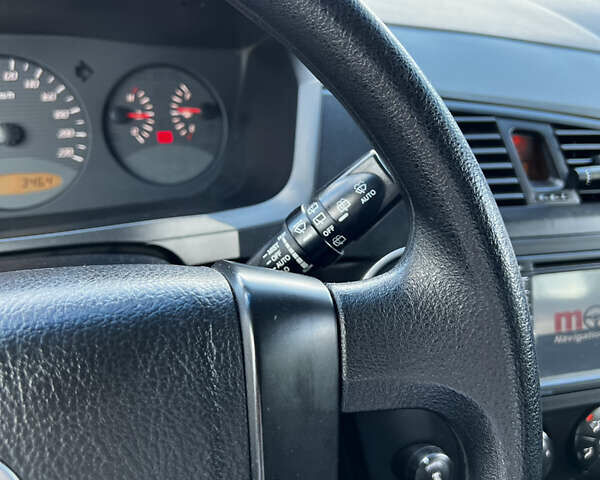 Чорний Cанг Йонг Kyron, об'ємом двигуна 2 л та пробігом 107 тис. км за 6800 $, фото 12 на Automoto.ua