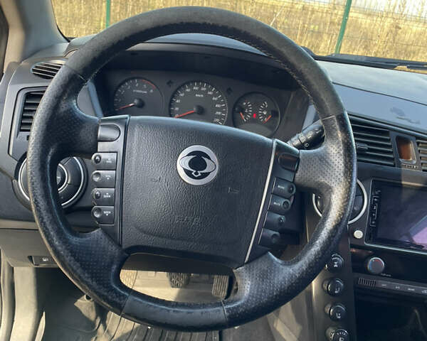 Черный Cанг Йонг Кирон, объемом двигателя 2 л и пробегом 220 тыс. км за 4250 $, фото 7 на Automoto.ua