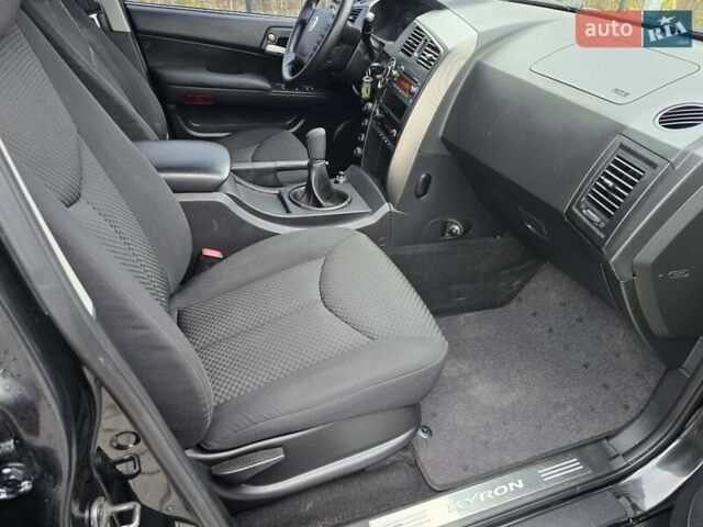 Чорний Cанг Йонг Kyron, об'ємом двигуна 2 л та пробігом 114 тис. км за 8000 $, фото 10 на Automoto.ua