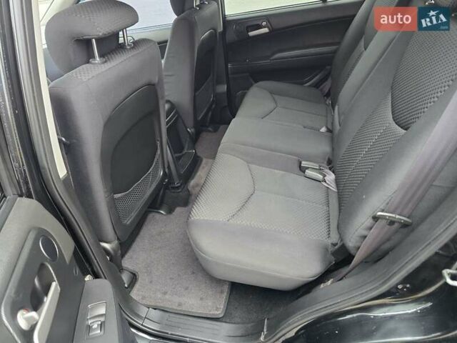 Чорний Cанг Йонг Kyron, об'ємом двигуна 2 л та пробігом 114 тис. км за 8000 $, фото 13 на Automoto.ua