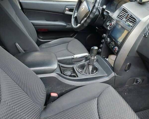 Черный Cанг Йонг Кирон, объемом двигателя 2.3 л и пробегом 129 тыс. км за 6900 $, фото 11 на Automoto.ua