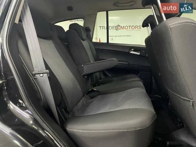 Черный Cанг Йонг Кирон, объемом двигателя 2.3 л и пробегом 221 тыс. км за 6490 $, фото 29 на Automoto.ua