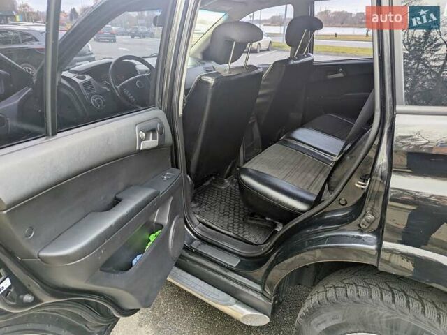 Черный Cанг Йонг Кирон, объемом двигателя 2 л и пробегом 155 тыс. км за 8000 $, фото 5 на Automoto.ua