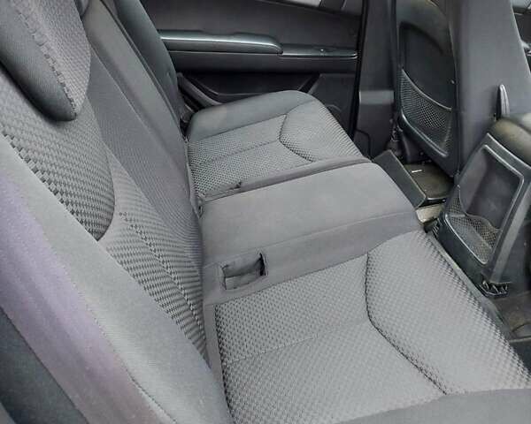 Черный Cанг Йонг Кирон, объемом двигателя 2.3 л и пробегом 129 тыс. км за 6900 $, фото 12 на Automoto.ua