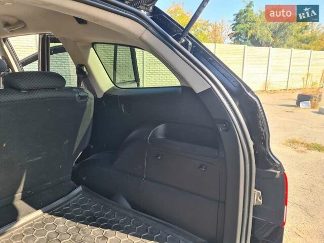 Чорний Cанг Йонг Kyron, об'ємом двигуна 2 л та пробігом 133 тис. км за 10000 $, фото 29 на Automoto.ua