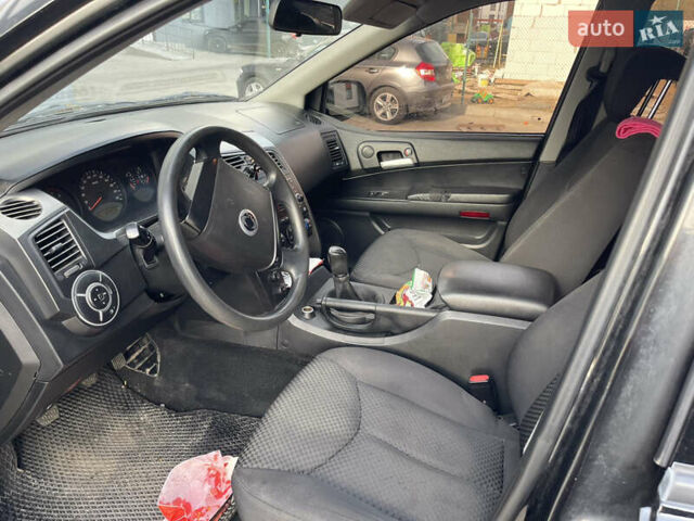 Чорний Cанг Йонг Kyron, об'ємом двигуна 2 л та пробігом 320 тис. км за 6700 $, фото 2 на Automoto.ua