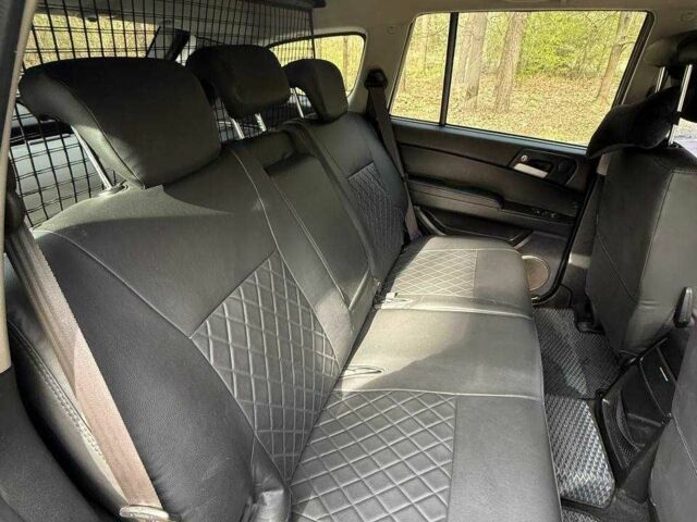 Черный Cанг Йонг Кирон, объемом двигателя 2 л и пробегом 150 тыс. км за 8700 $, фото 12 на Automoto.ua