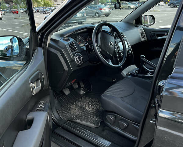 Чорний Cанг Йонг Kyron, об'ємом двигуна 2 л та пробігом 107 тис. км за 6800 $, фото 7 на Automoto.ua