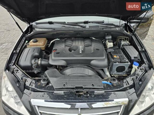 Чорний Cанг Йонг Kyron, об'ємом двигуна 2 л та пробігом 114 тис. км за 8000 $, фото 14 на Automoto.ua