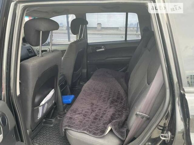 Чорний Cанг Йонг Kyron, об'ємом двигуна 2 л та пробігом 143 тис. км за 9300 $, фото 9 на Automoto.ua