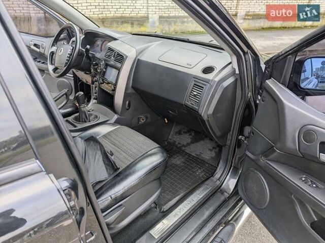 Черный Cанг Йонг Кирон, объемом двигателя 2 л и пробегом 155 тыс. км за 8000 $, фото 8 на Automoto.ua