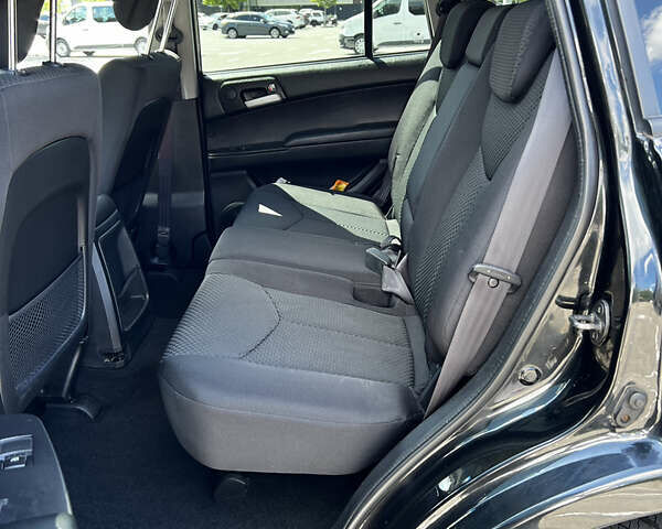 Чорний Cанг Йонг Kyron, об'ємом двигуна 2 л та пробігом 107 тис. км за 6800 $, фото 18 на Automoto.ua