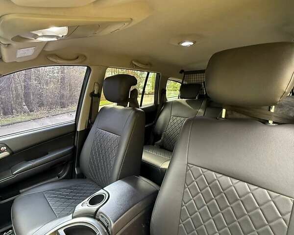 Черный Cанг Йонг Кирон, объемом двигателя 2 л и пробегом 150 тыс. км за 8300 $, фото 23 на Automoto.ua