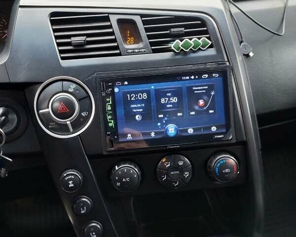 Черный Cанг Йонг Кирон, объемом двигателя 2.3 л и пробегом 129 тыс. км за 6900 $, фото 10 на Automoto.ua