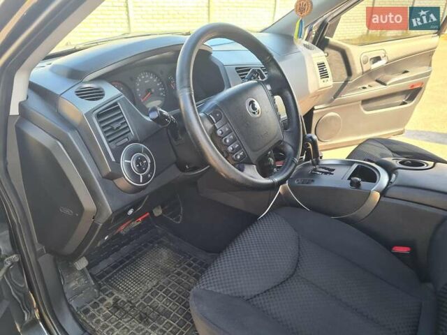 Чорний Cанг Йонг Kyron, об'ємом двигуна 2 л та пробігом 133 тис. км за 10000 $, фото 15 на Automoto.ua