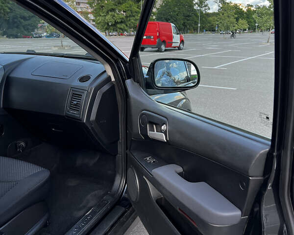 Чорний Cанг Йонг Kyron, об'ємом двигуна 2 л та пробігом 107 тис. км за 6800 $, фото 14 на Automoto.ua