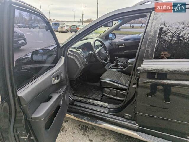 Черный Cанг Йонг Кирон, объемом двигателя 2 л и пробегом 155 тыс. км за 8000 $, фото 4 на Automoto.ua