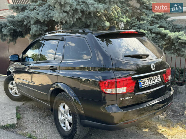 Чорний Cанг Йонг Kyron, об'ємом двигуна 2 л та пробігом 158 тис. км за 8200 $, фото 2 на Automoto.ua