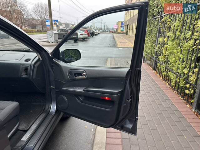 Черный Cанг Йонг Кирон, объемом двигателя 2 л и пробегом 69 тыс. км за 8800 $, фото 20 на Automoto.ua