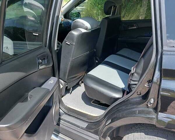 Черный Cанг Йонг Кирон, объемом двигателя 2 л и пробегом 180 тыс. км за 10300 $, фото 15 на Automoto.ua