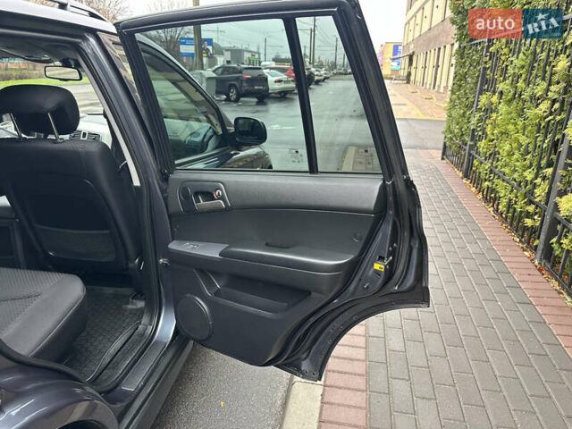 Черный Cанг Йонг Кирон, объемом двигателя 2 л и пробегом 69 тыс. км за 8800 $, фото 17 на Automoto.ua