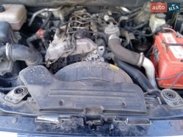 Черный Cанг Йонг Кирон, объемом двигателя 2 л и пробегом 227 тыс. км за 7800 $, фото 12 на Automoto.ua