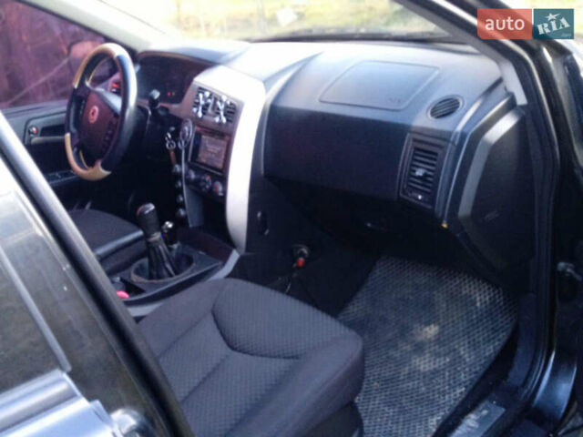 Черный Cанг Йонг Кирон, объемом двигателя 2 л и пробегом 227 тыс. км за 6800 $, фото 10 на Automoto.ua