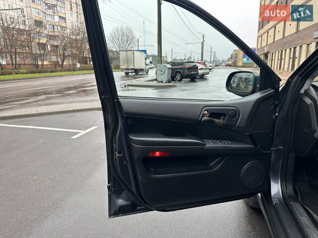 Черный Cанг Йонг Кирон, объемом двигателя 2 л и пробегом 69 тыс. км за 8800 $, фото 12 на Automoto.ua