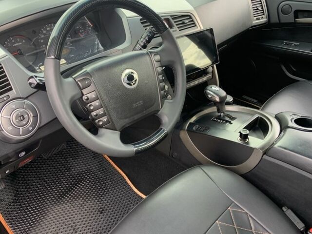 Чорний Cанг Йонг Kyron, об'ємом двигуна 2 л та пробігом 268 тис. км за 10000 $, фото 5 на Automoto.ua