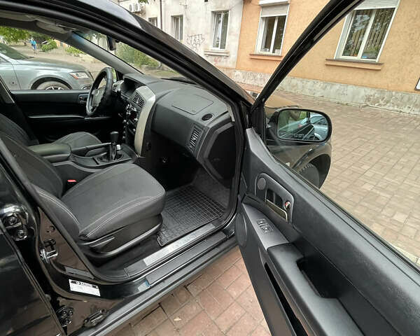 Чорний Cанг Йонг Kyron, об'ємом двигуна 2 л та пробігом 127 тис. км за 9100 $, фото 7 на Automoto.ua