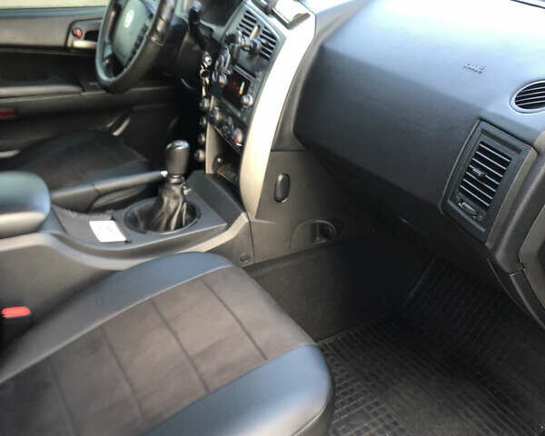 Черный Cанг Йонг Кирон, объемом двигателя 2.3 л и пробегом 86 тыс. км за 8200 $, фото 8 на Automoto.ua