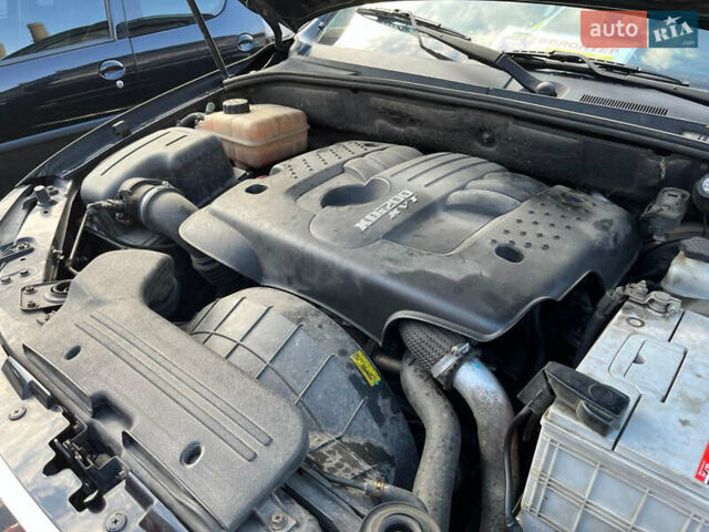 Черный Cанг Йонг Кирон, объемом двигателя 2 л и пробегом 177 тыс. км за 8700 $, фото 11 на Automoto.ua