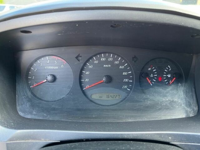 Чорний Cанг Йонг Kyron, об'ємом двигуна 2 л та пробігом 177 тис. км за 10000 $, фото 6 на Automoto.ua