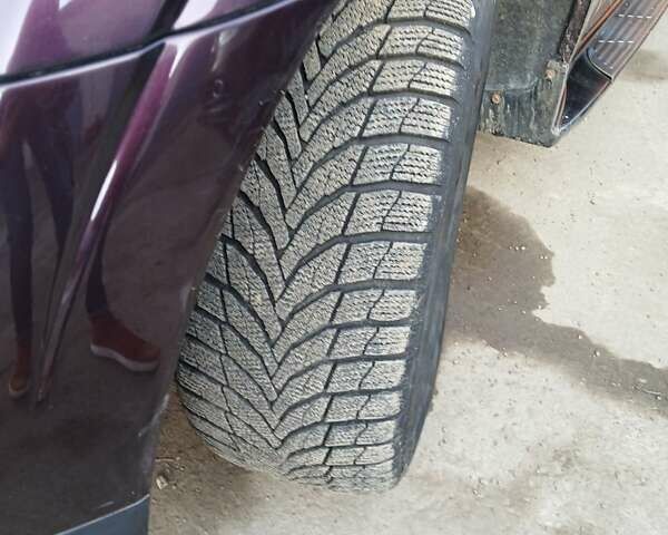 Фиолетовый Cанг Йонг Кирон, объемом двигателя 2 л и пробегом 64 тыс. км за 7500 $, фото 7 на Automoto.ua