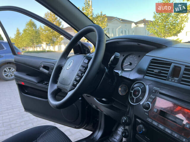 Фіолетовий Cанг Йонг Kyron, об'ємом двигуна 2 л та пробігом 130 тис. км за 8700 $, фото 12 на Automoto.ua