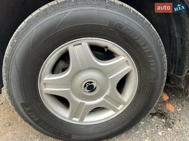 Коричневый Cанг Йонг Кирон, объемом двигателя 2 л и пробегом 310 тыс. км за 3700 $, фото 21 на Automoto.ua