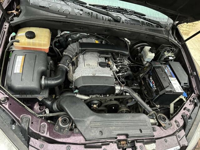 Коричневый Cанг Йонг Кирон, объемом двигателя 2.3 л и пробегом 260 тыс. км за 6800 $, фото 7 на Automoto.ua