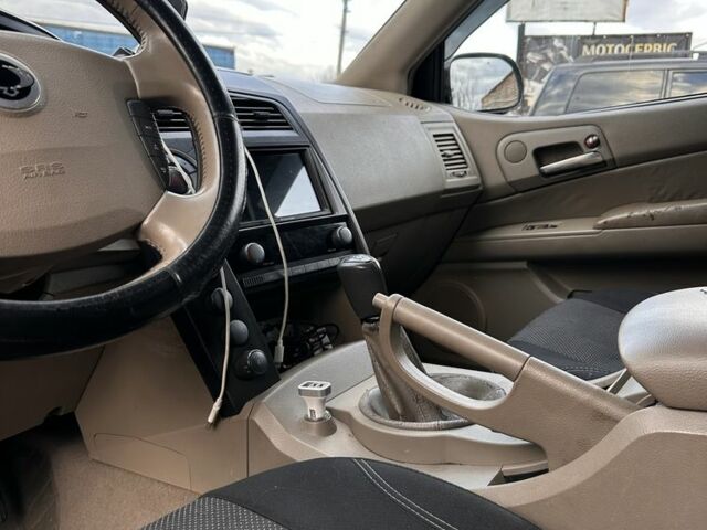 Красный Cанг Йонг Кирон, объемом двигателя 2 л и пробегом 249 тыс. км за 4999 $, фото 4 на Automoto.ua