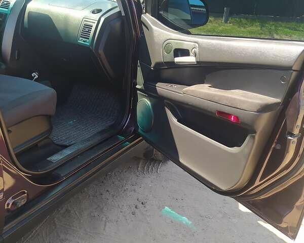 Червоний Cанг Йонг Kyron, об'ємом двигуна 2.3 л та пробігом 133 тис. км за 8100 $, фото 13 на Automoto.ua
