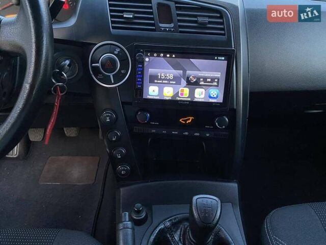 Красный Cанг Йонг Кирон, объемом двигателя 2 л и пробегом 61 тыс. км за 8800 $, фото 25 на Automoto.ua