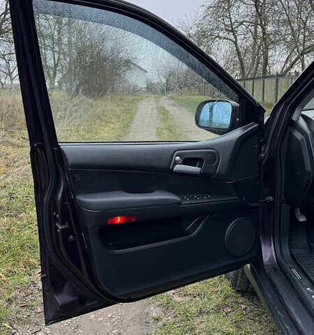 Червоний Cанг Йонг Kyron, об'ємом двигуна 2 л та пробігом 350 тис. км за 6400 $, фото 22 на Automoto.ua