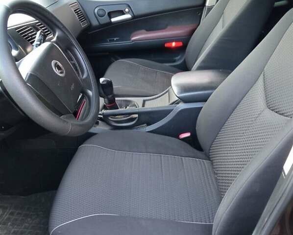 Красный Cанг Йонг Кирон, объемом двигателя 2 л и пробегом 154 тыс. км за 7400 $, фото 14 на Automoto.ua