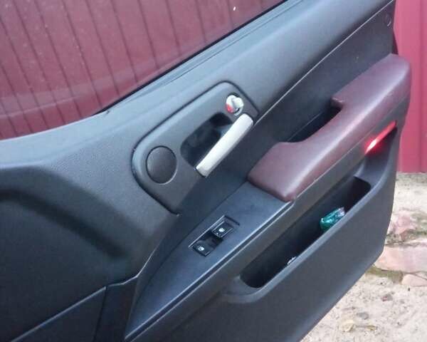 Красный Cанг Йонг Кирон, объемом двигателя 2 л и пробегом 154 тыс. км за 7400 $, фото 10 на Automoto.ua