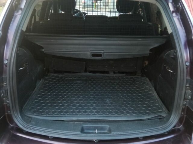 Cанг Йонг Кирон 2010 в Овруче на Automoto.ua Красный Cанг Йонг Кирон, объемом двигателя 2 л и пробегом 158 тыс. км за 7500 $, фото 4 на Automoto.ua